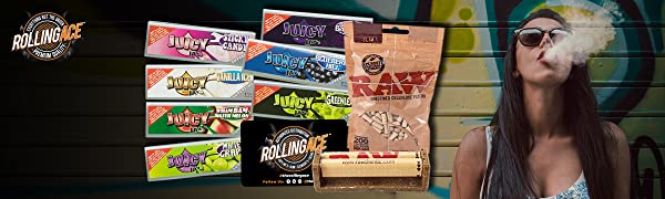 Woman uses juicy jays rolling papers 1 1/4 bundle with raw rolling machine and cigarette filters